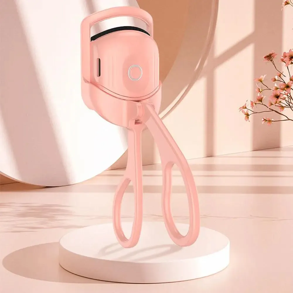 Curls with a portable electric heated comb eyelash curler Heated eyelash