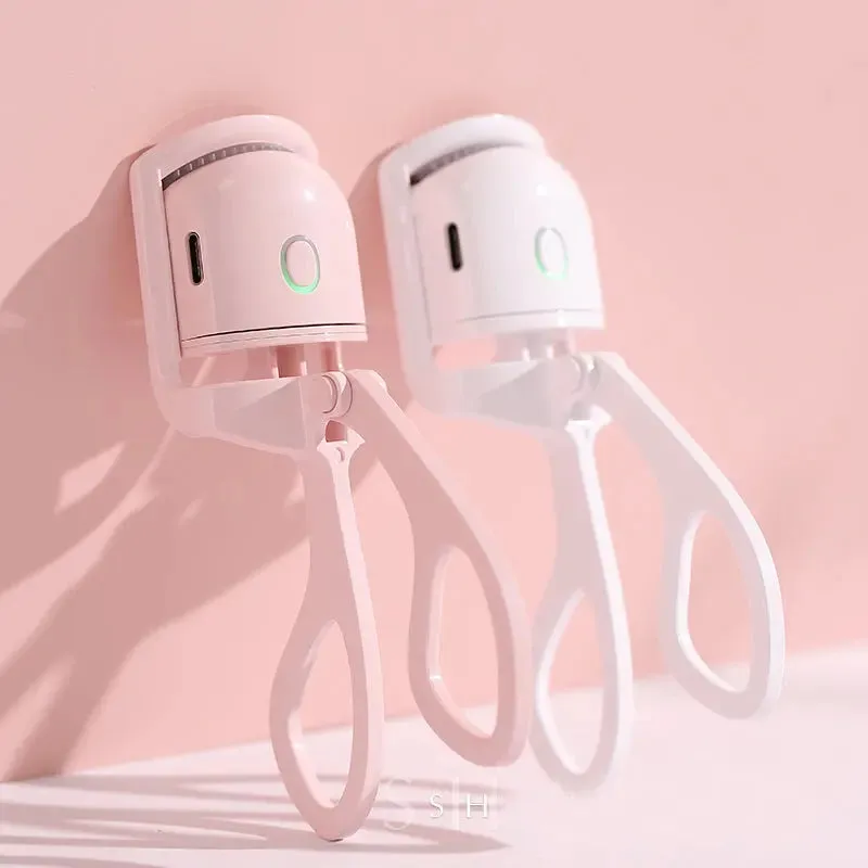 Curls with a portable electric heated comb eyelash curler Heated eyelash