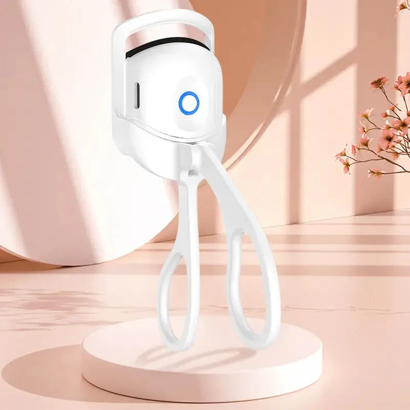 Curls with a portable electric heated comb eyelash curler Heated eyelash